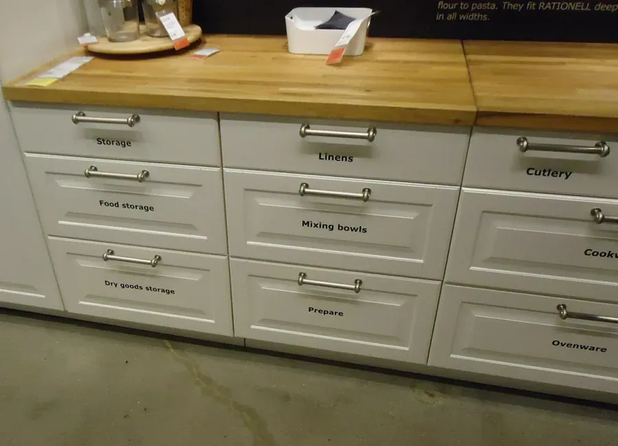 Refinished kitchen cabinets with a smooth painted finish