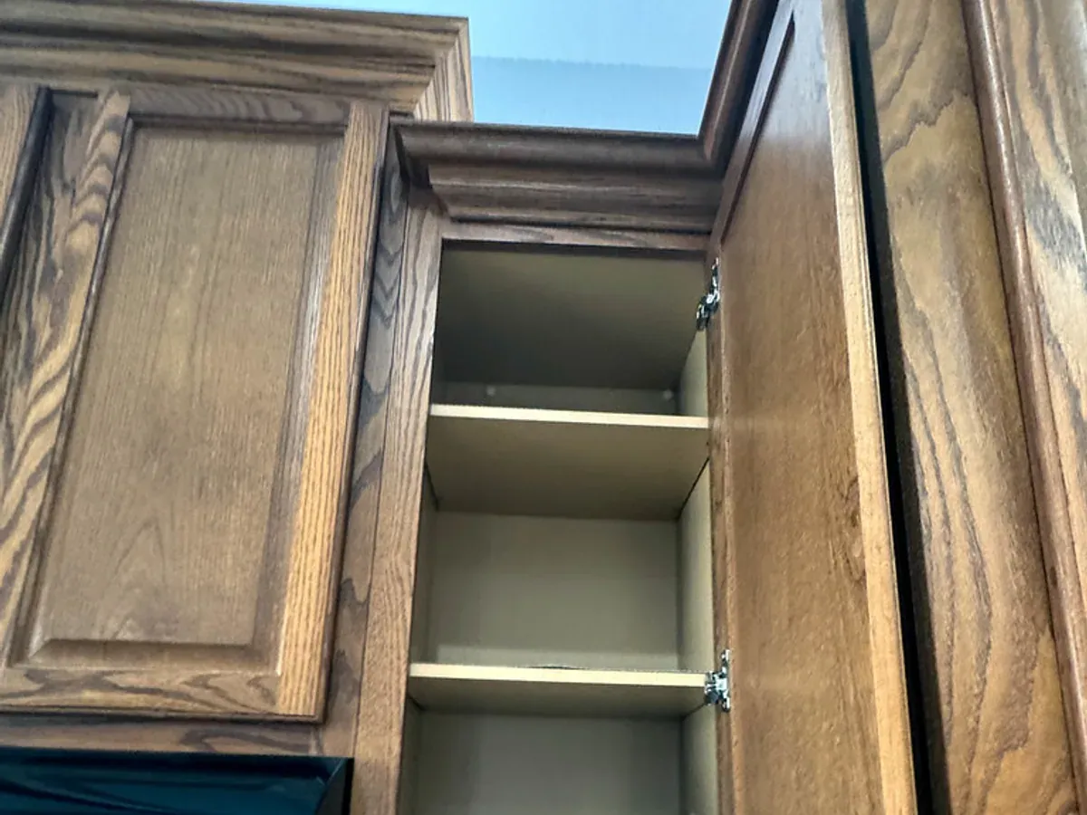 Freshly sprayed kitchen cabinets with a smooth, even finish